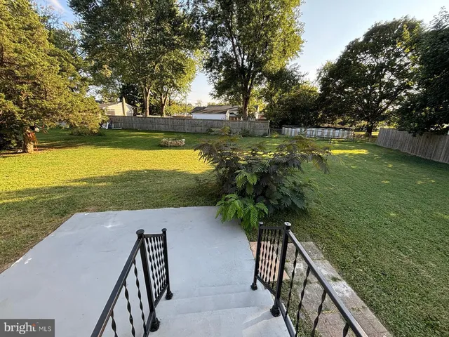 a view of a lake with a garden
