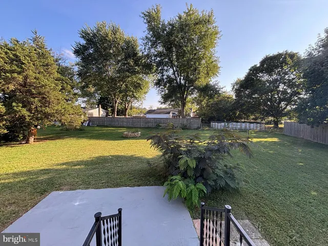 a view of a lake with a yard