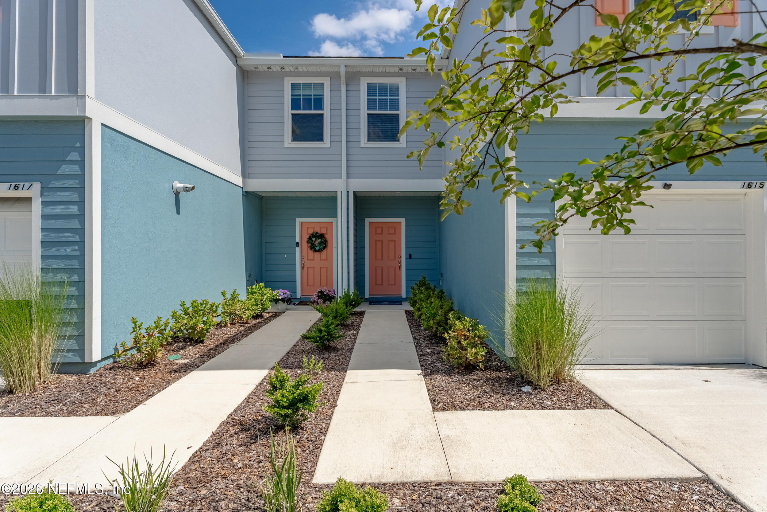 1615 Cluny Road Jacksonville, FL 32218 - Photo 2 of 18 a front view of a house with garden