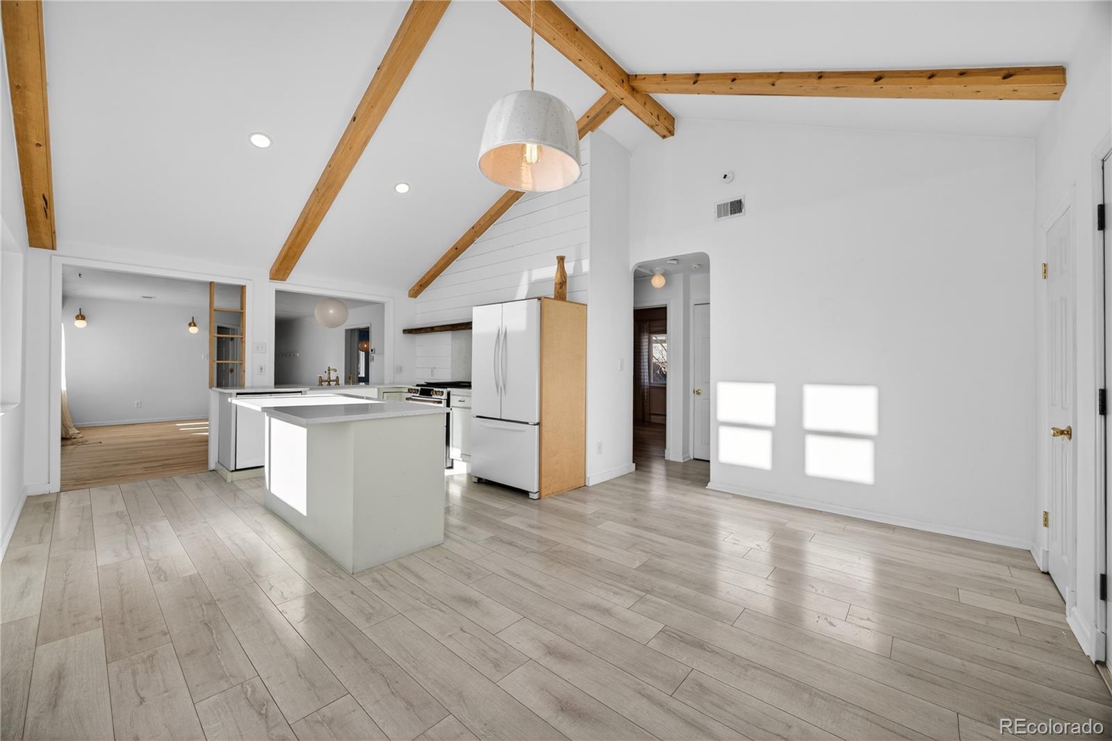 2375 Hanover Street Aurora, CO 80010 - Photo 2 of 36 a view of a kitchen with refrigerator and windows