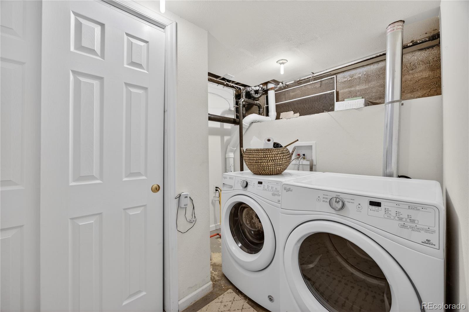 2375 Hanover Street Aurora, CO 80010 - Photo 23 of 36 a utility room with dryer and washer