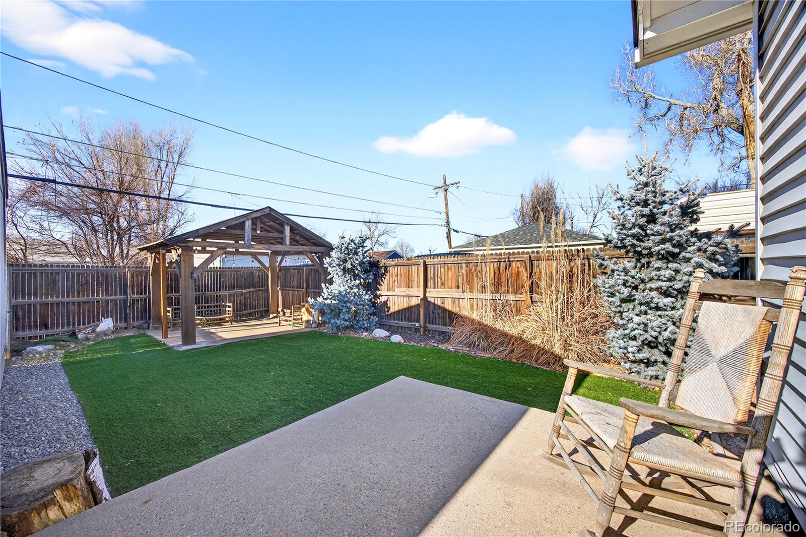 2375 Hanover Street Aurora, CO 80010 - Photo 24 of 36 a view of a house with a yard