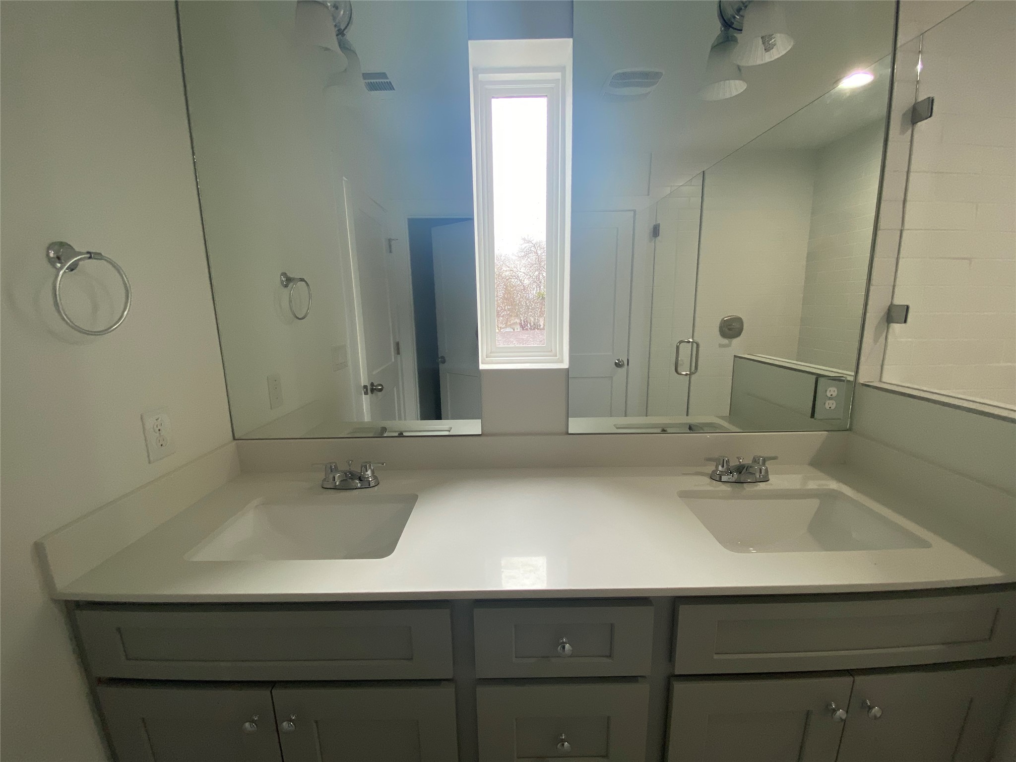 1916 Webberville Road, Unit B Austin, TX 78721 - Photo 18 of 25 Dual vanity with integrated sinks and chrome fixtures