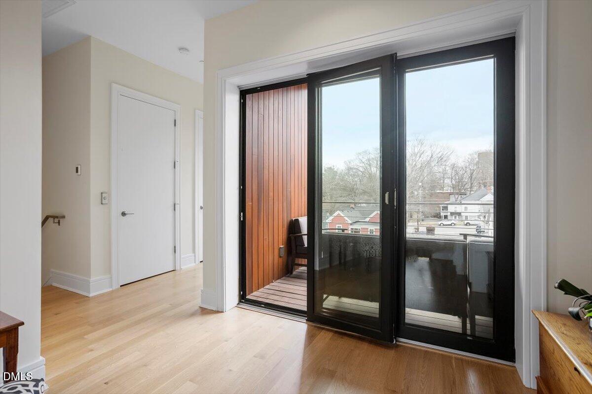 206 Dundas Lane Raleigh, NC 27603 - Photo 6 of 30 a view of a glass door with a glass door