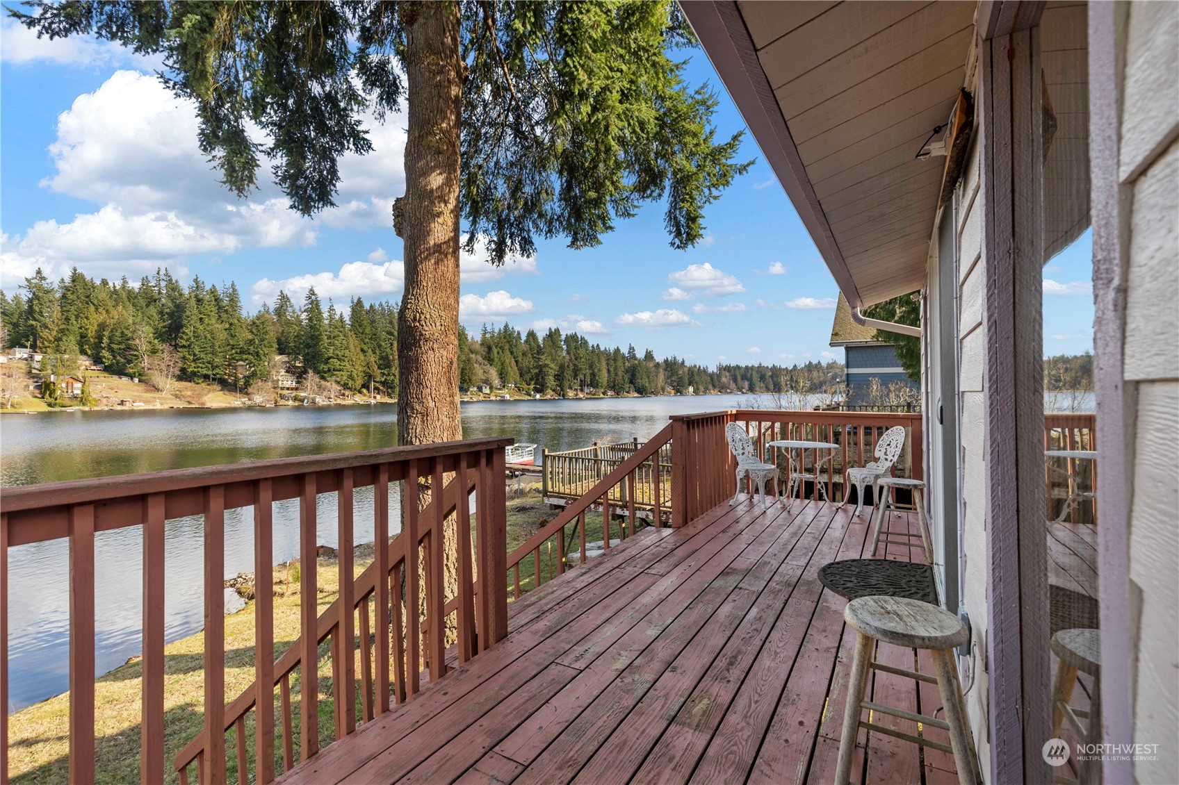 5523 Lerch Road Snohomish, WA 98290 - Photo 24 of 32 a view of balcony with wooden floor and lake view