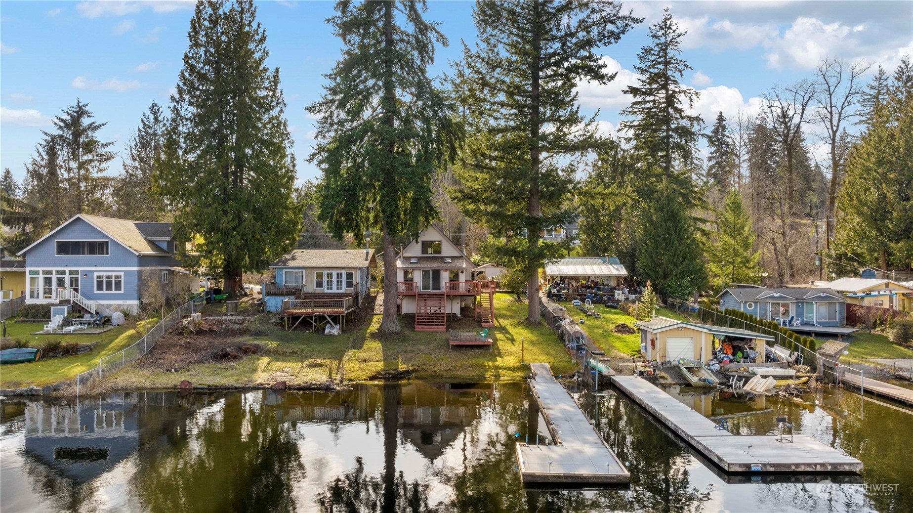 5523 Lerch Road Snohomish, WA 98290 - Photo 29 of 32 aerial view of a house with swimming pool and large trees