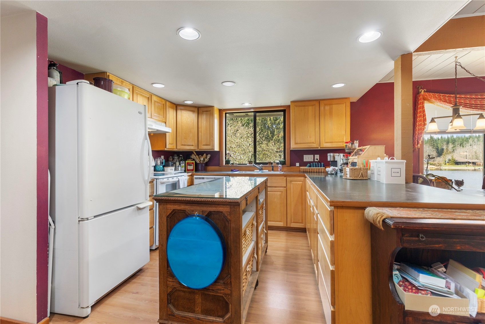 5523 Lerch Road Snohomish, WA 98290 - Photo 5 of 32 a kitchen with granite countertop a sink appliances a counter space and a window
