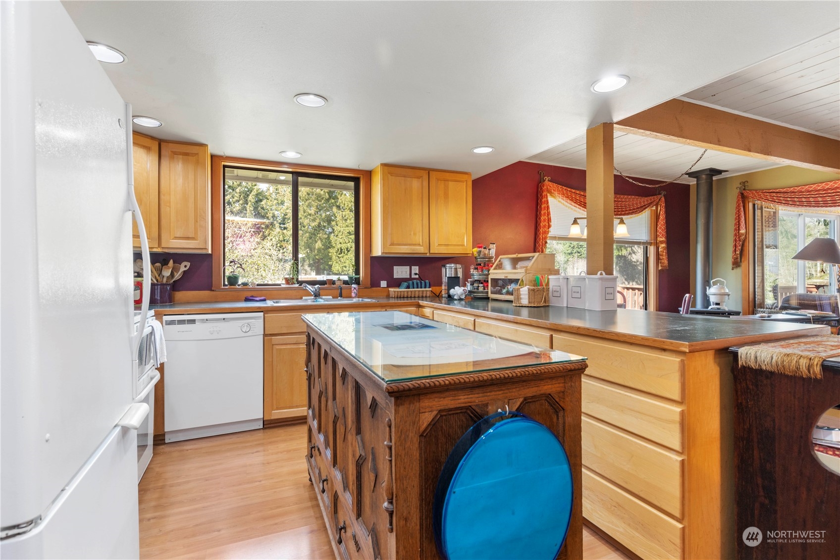 5523 Lerch Road Snohomish, WA 98290 - Photo 6 of 32 a kitchen with a stove a sink a refrigerator and a microwave