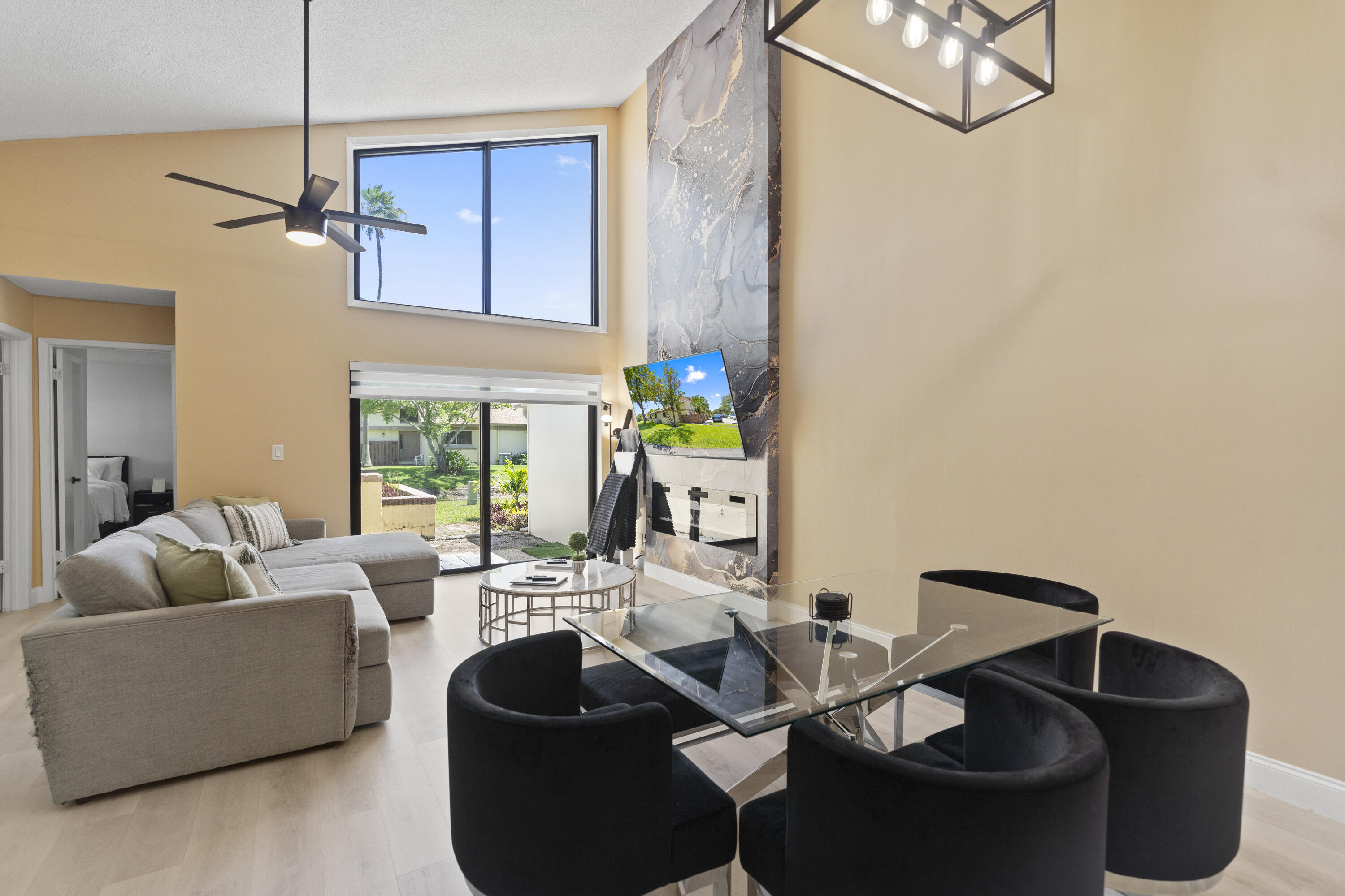 10650 Northwest 30th Place, Unit 1 Sunrise, FL 33322 - Photo 15 of 38 a living room with furniture and a potted plant