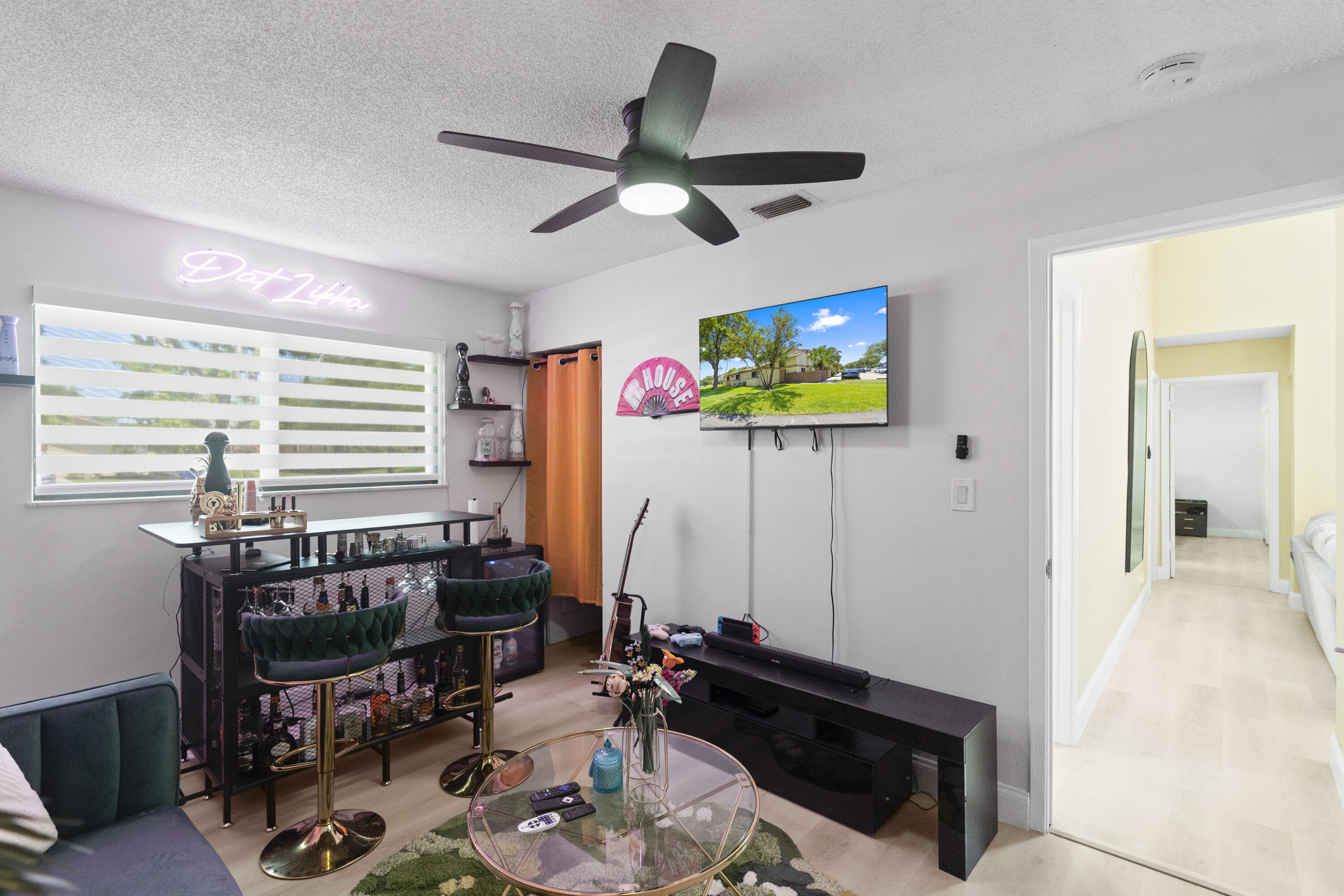 10650 Northwest 30th Place, Unit 1 Sunrise, FL 33322 - Photo 23 of 38 a room with furniture and a window