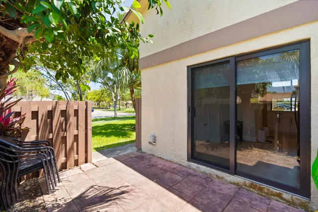 a view of a backyard of a house