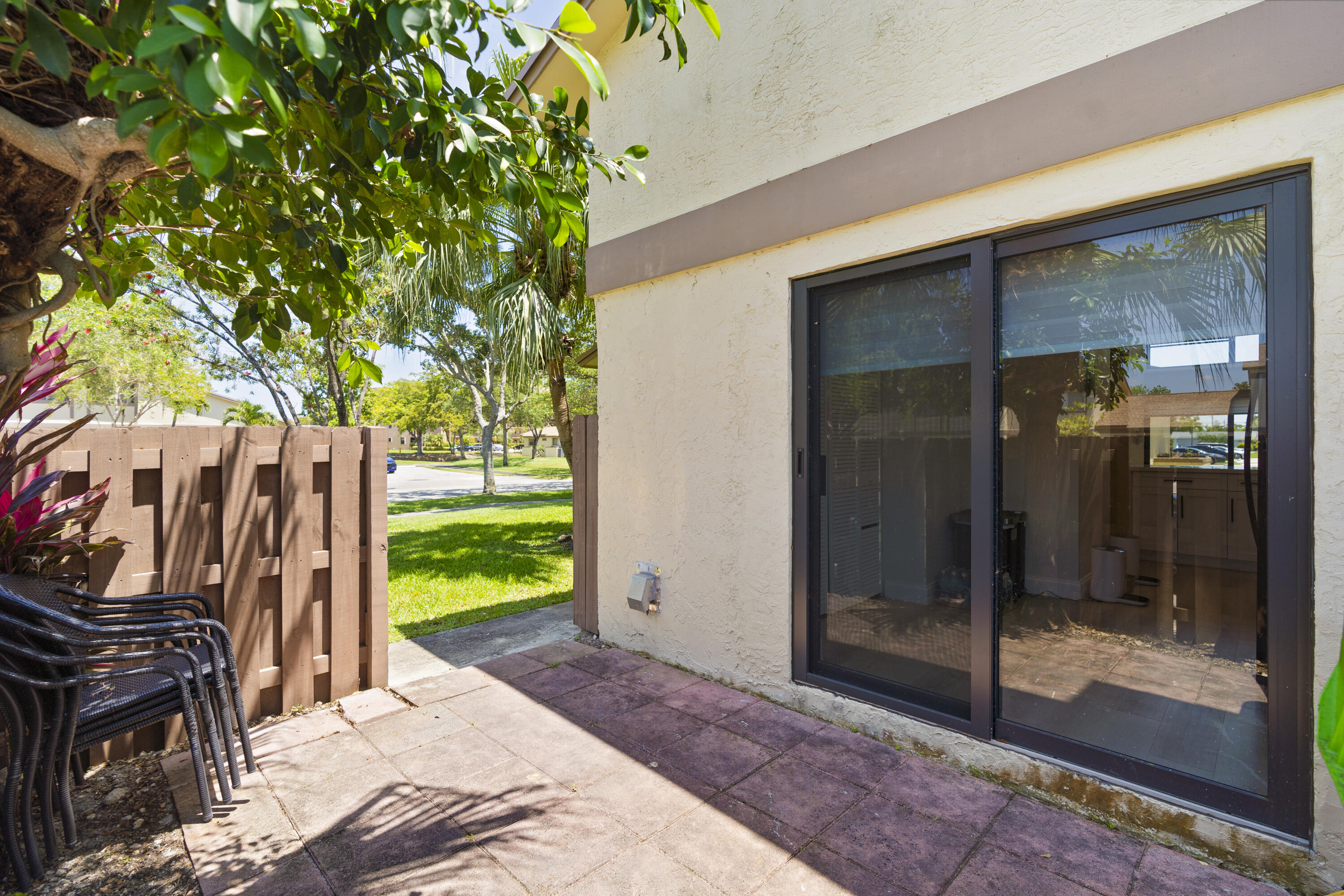 10650 Northwest 30th Place, Unit 1 Sunrise, FL 33322 - Photo 7 of 38 a view of a backyard of a house