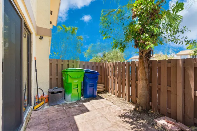 a view of a backyard with a trees