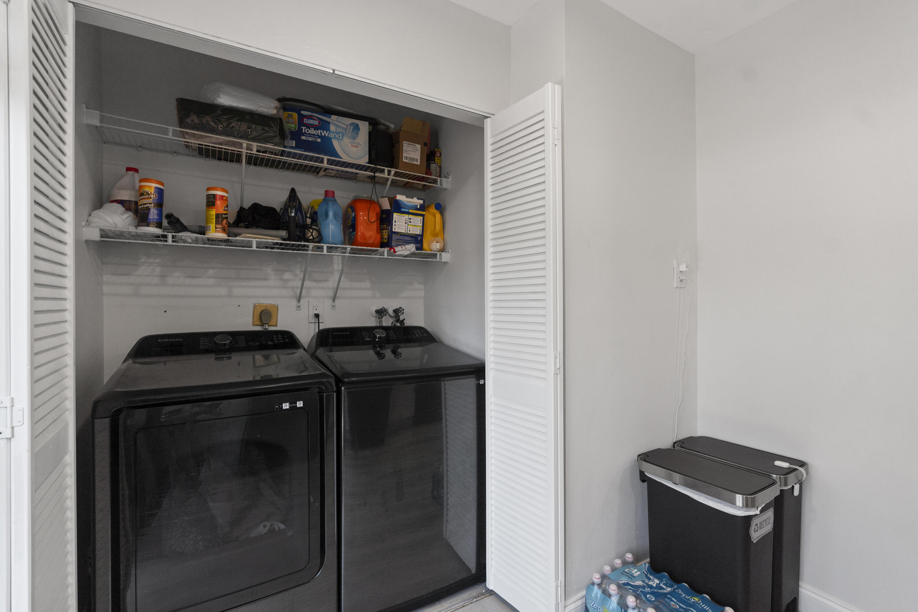 10650 Northwest 30th Place, Unit 1 Sunrise, FL 33322 - Photo 9 of 38 a close view of shoes and cabinets