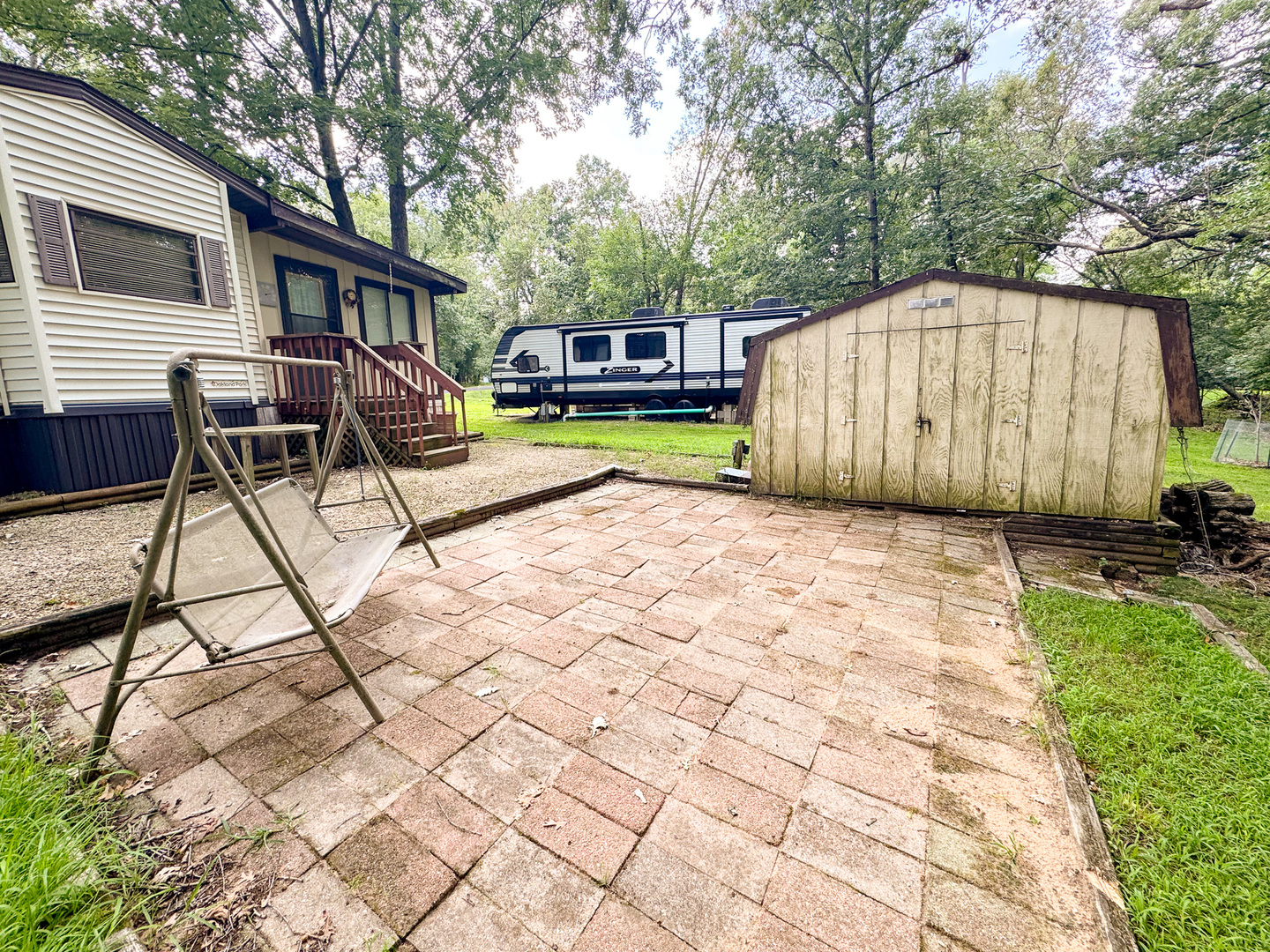 21-102 Woodhaven Sublette, IL 61367 - Photo 4 of 19 a view of a backyard with a sitting area