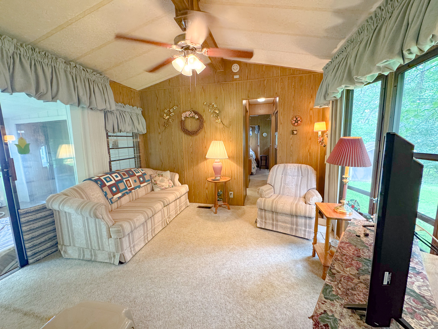 21-102 Woodhaven Sublette, IL 61367 - Photo 10 of 19 a living room with furniture and a large mirror