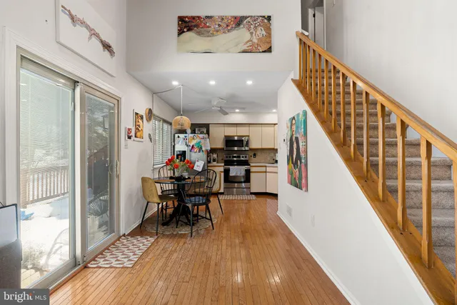 a view of a living room and dining room