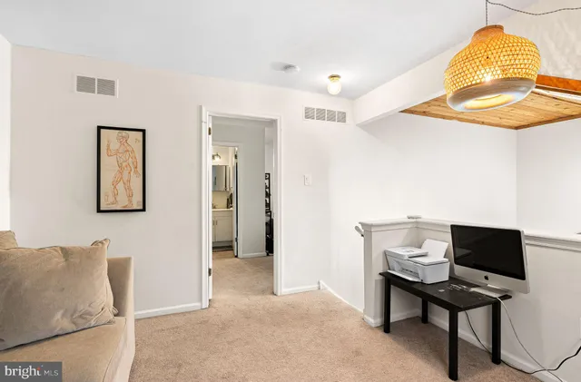 a workspace with furniture and a table