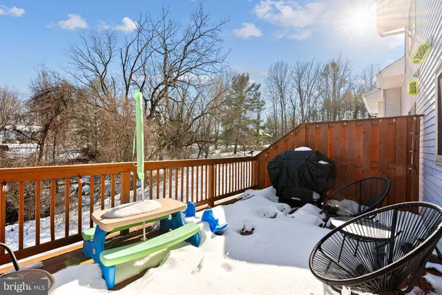 a view of a balcony with chairs