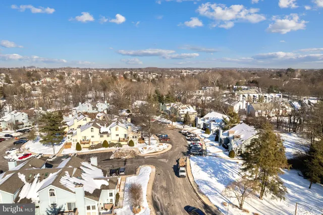 an aerial view of residential building with parking space