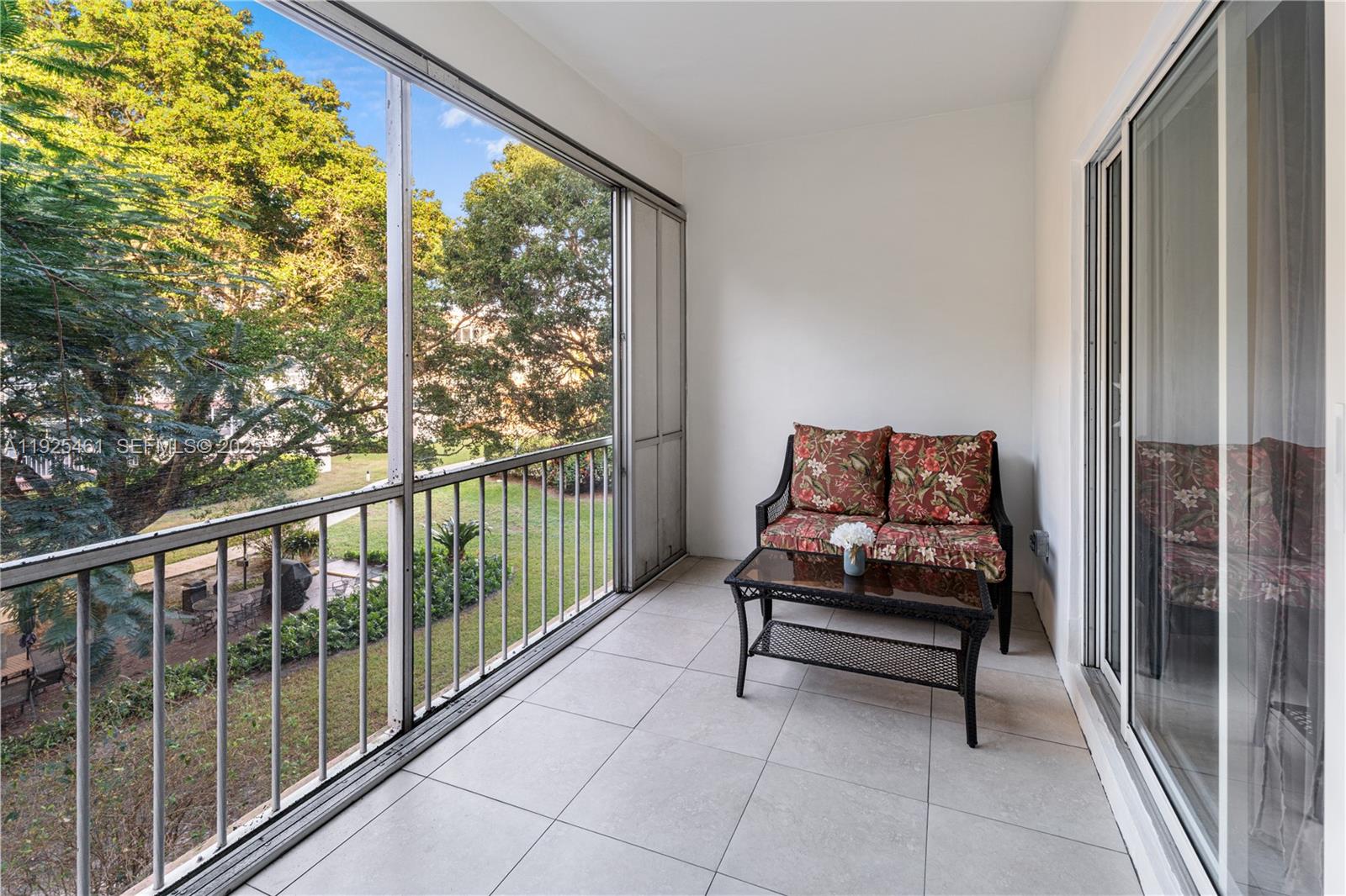6751 Cypress Road, Unit 207 Plantation, FL 33317 - Photo 20 of 20 a bench sitting in front of a window
