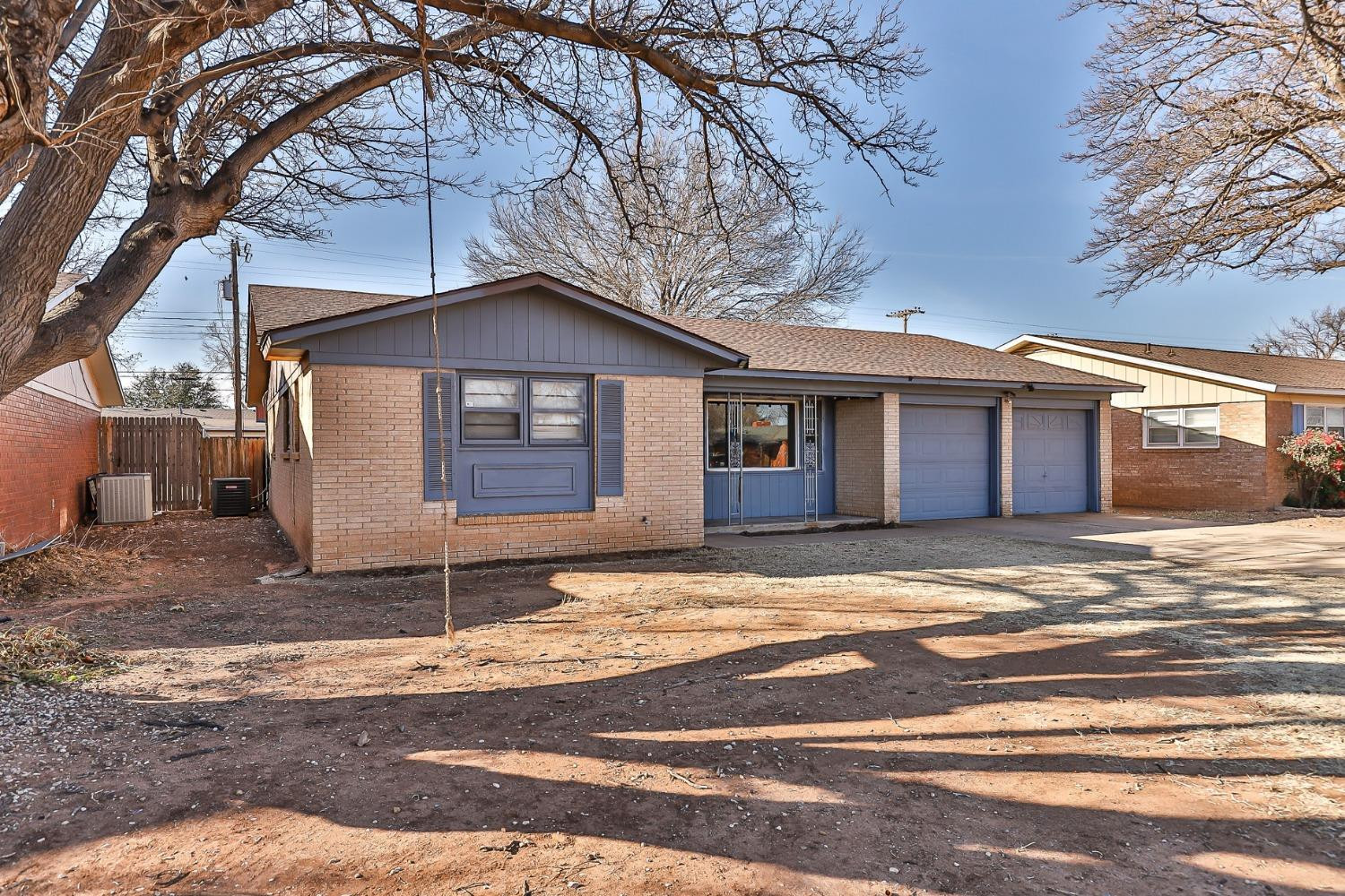 3621 56th Street Lubbock, TX 79413 - Photo 3 of 32 a view of a house with a patio