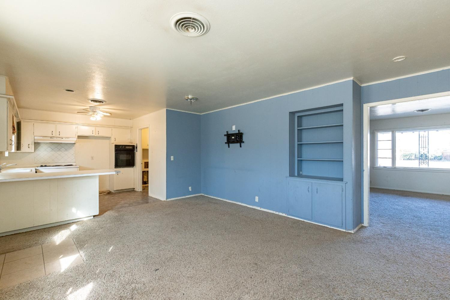 3621 56th Street Lubbock, TX 79413 - Photo 9 of 32 a view of a kitchen and a windows