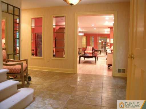 21 Navajo Road East Brunswick, NJ 08816 - Photo 3 of 8 a living room with furniture and large windows