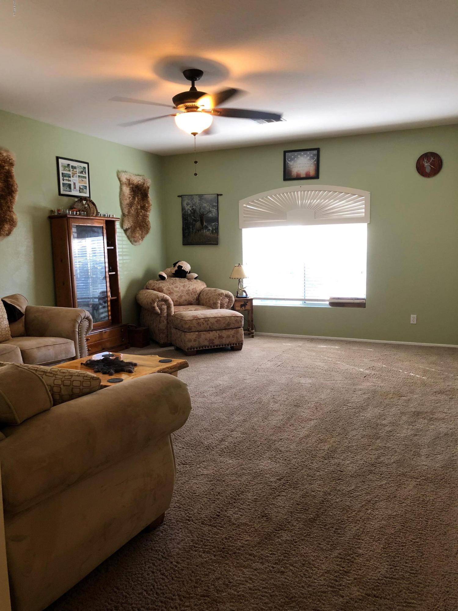 15832 West Calavar Road Surprise, AZ 85379 - Photo 16 of 58 LIVING ROOM