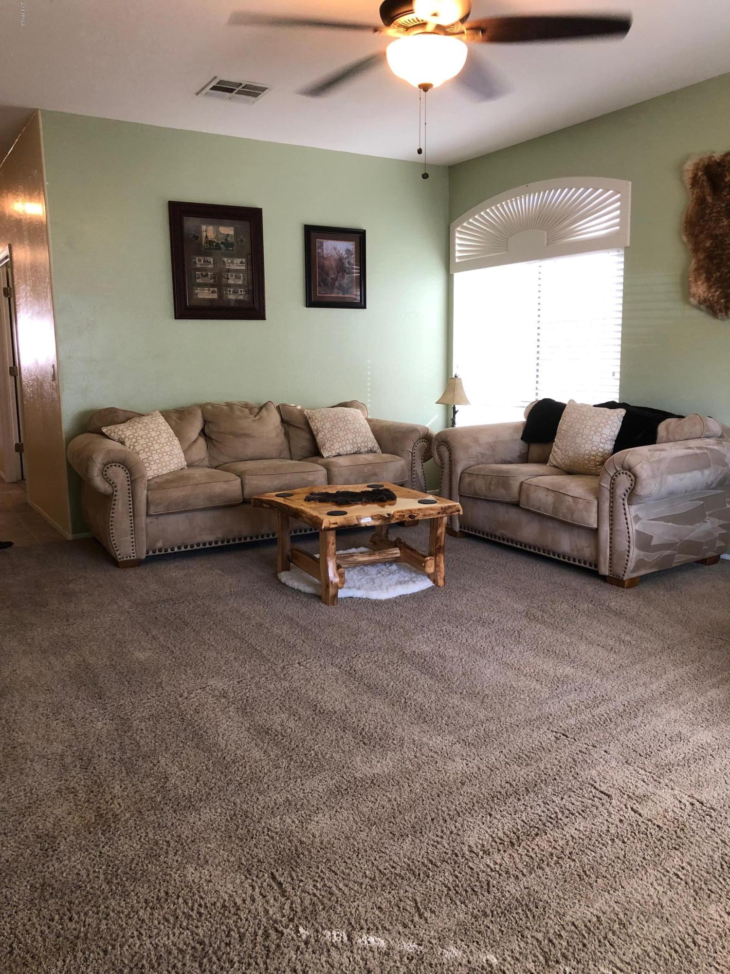 15832 West Calavar Road Surprise, AZ 85379 - Photo 18 of 58 LIVING ROOM