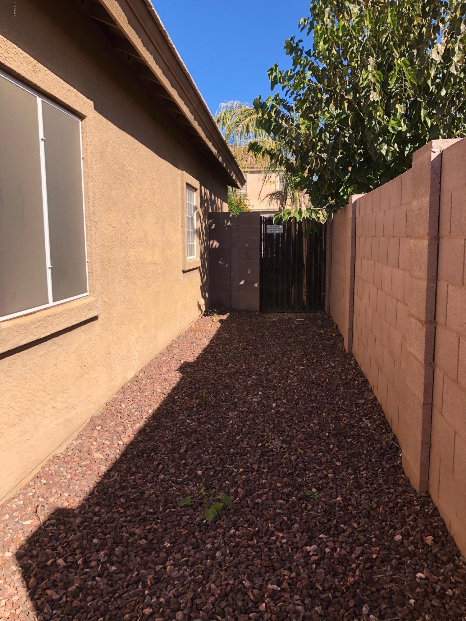 15832 West Calavar Road Surprise, AZ 85379 - Photo 39 of 58 SIDE GATE