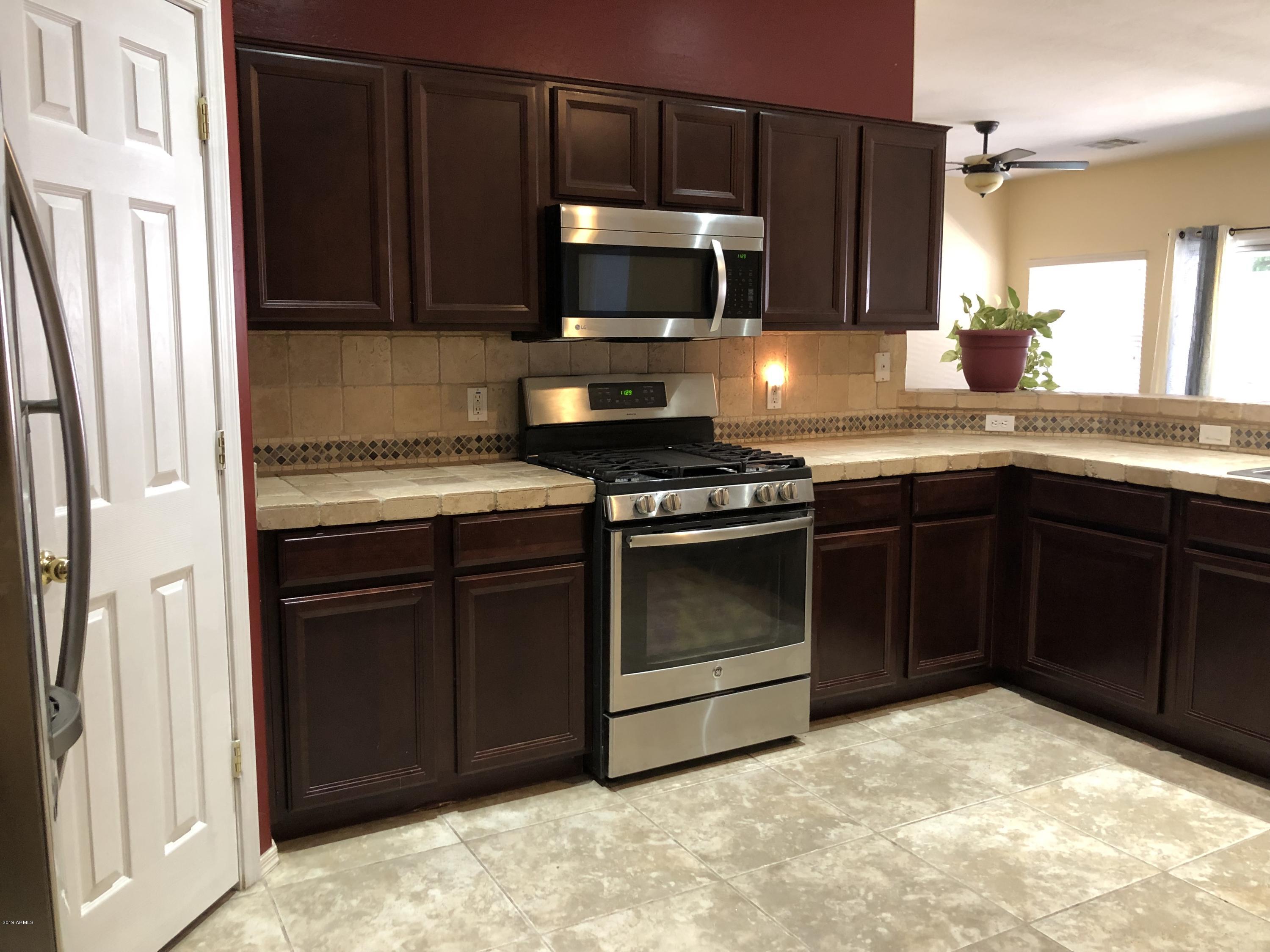 15832 West Calavar Road Surprise, AZ 85379 - Photo 40 of 58 KITCHEN