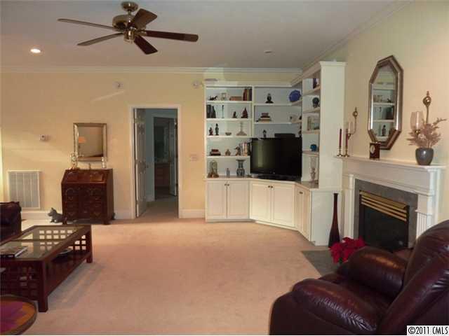 331 Gringley Hill Road Fort Mill, SC 29708 - Photo 3 of 16 a living room with furniture and a fireplace