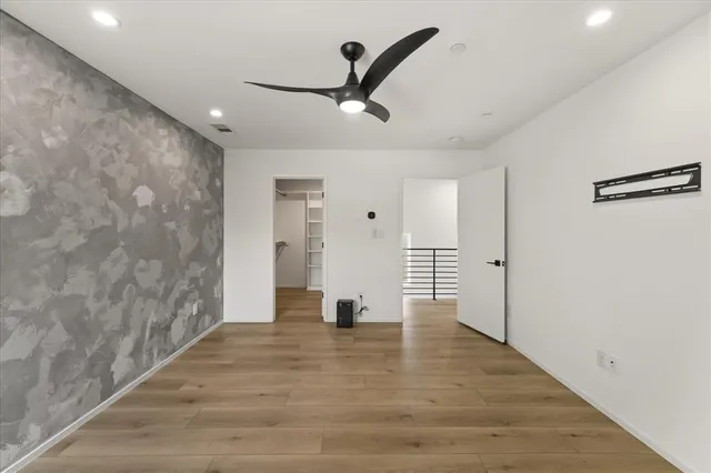 a bathroom with a toilet sink and shower
