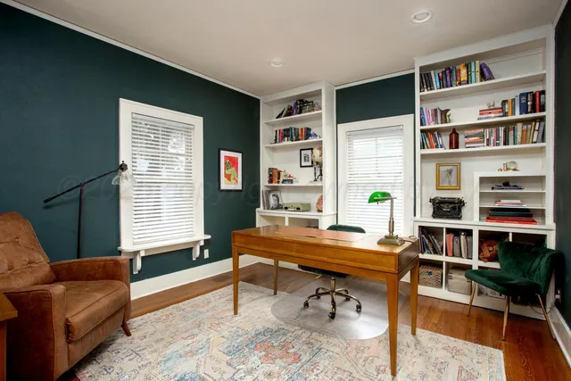 a living room with furniture and window