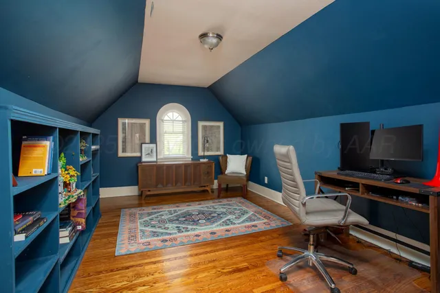 a bathroom with a sink and a window