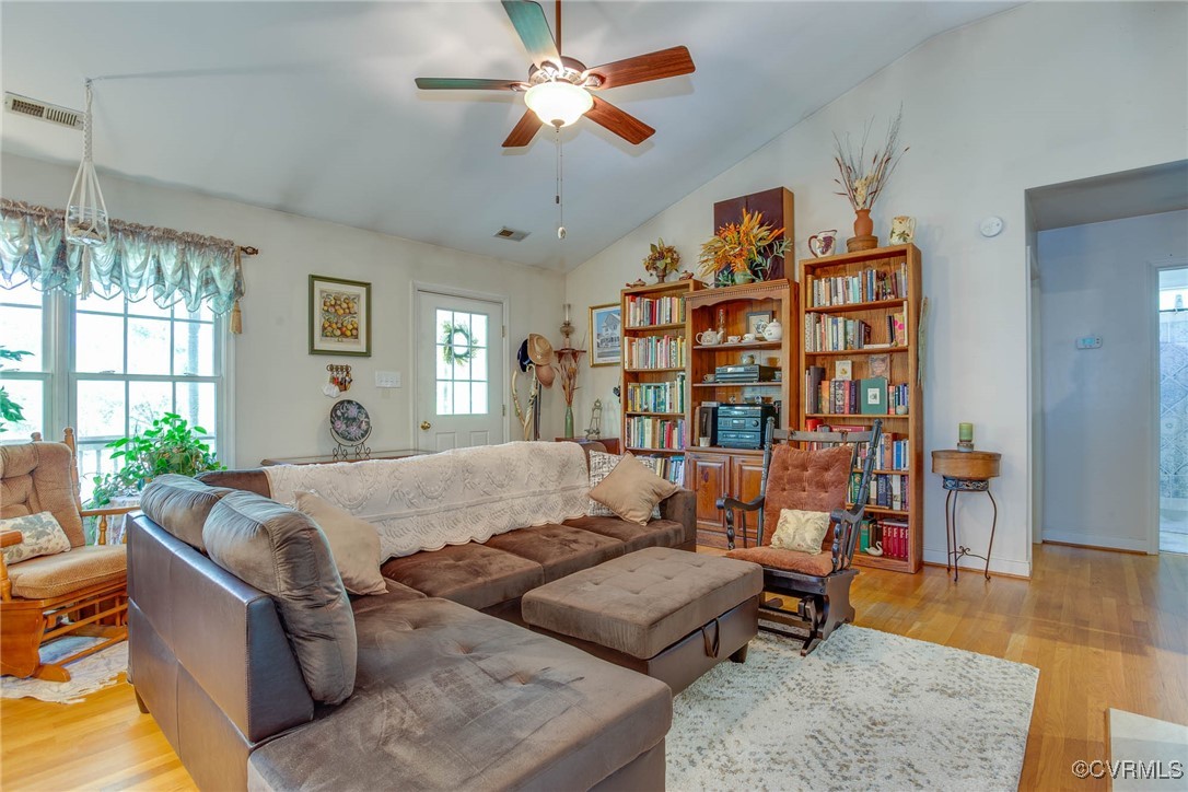 3875 Wakema Road West Point, VA 23181 - Photo 14 of 45 a living room with furniture ceiling fan and a window