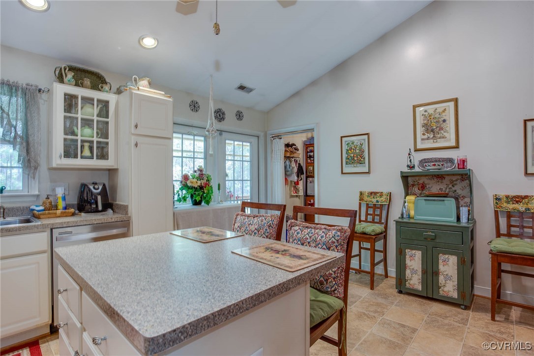 3875 Wakema Road West Point, VA 23181 - Photo 19 of 45 a view of a dining room with furniture and wooden floor