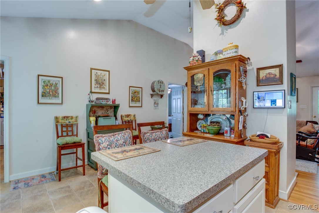 3875 Wakema Road West Point, VA 23181 - Photo 20 of 45 a view of a dining room with furniture and a kitchen
