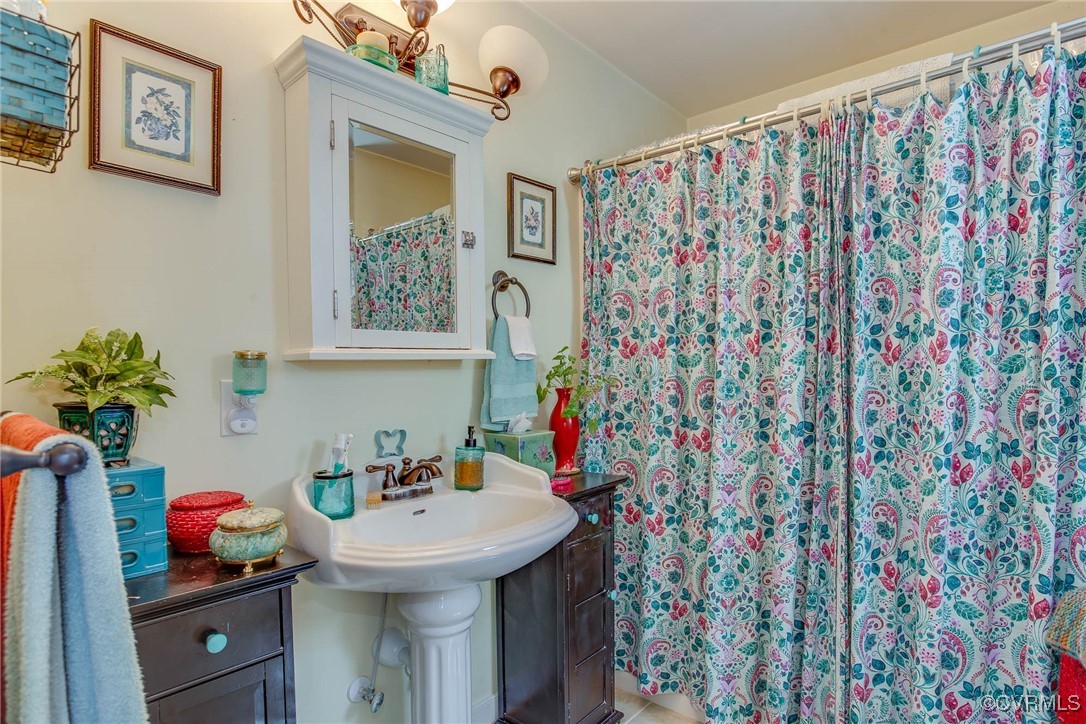 3875 Wakema Road West Point, VA 23181 - Photo 23 of 45 a bathroom with a sink toilet and vanity
