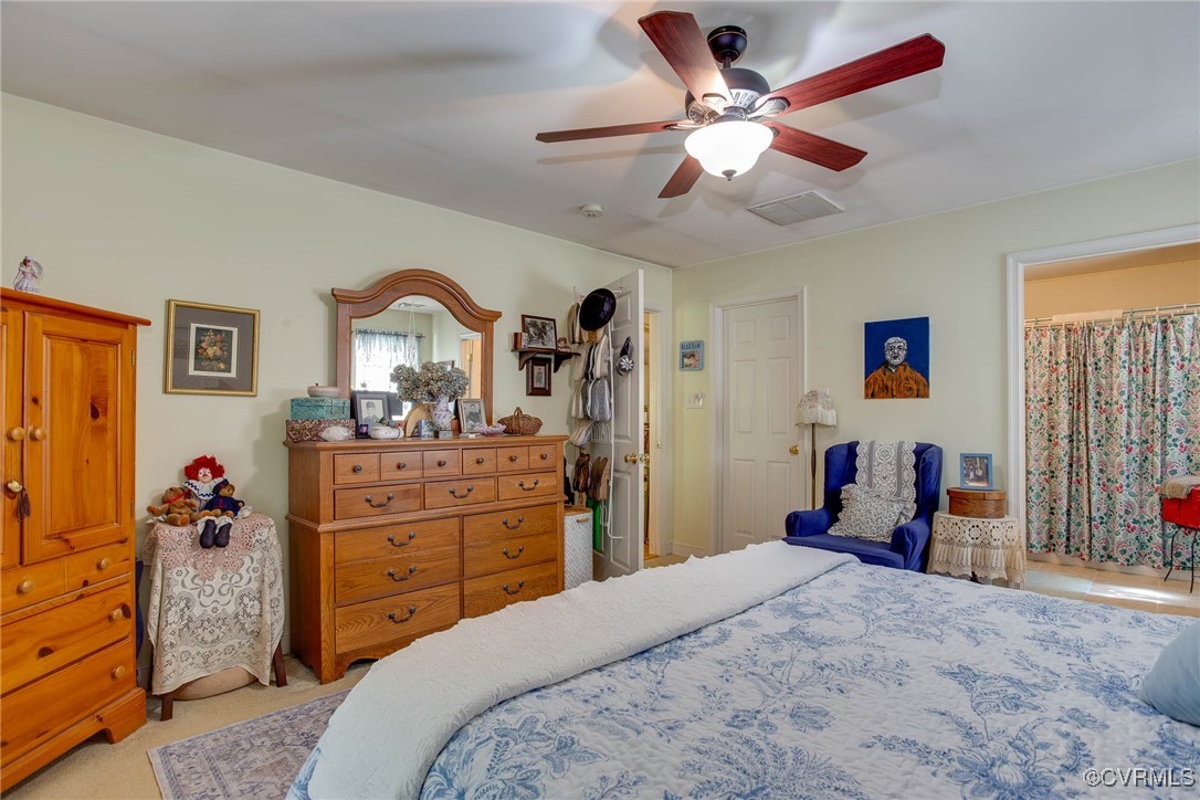 3875 Wakema Road West Point, VA 23181 - Photo 26 of 45 a bedroom with a bed and a dresser