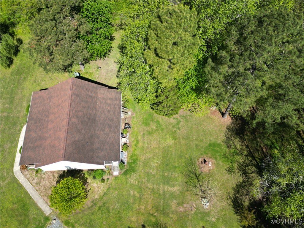 3875 Wakema Road West Point, VA 23181 - Photo 34 of 45 a backyard of a house with lots of green space