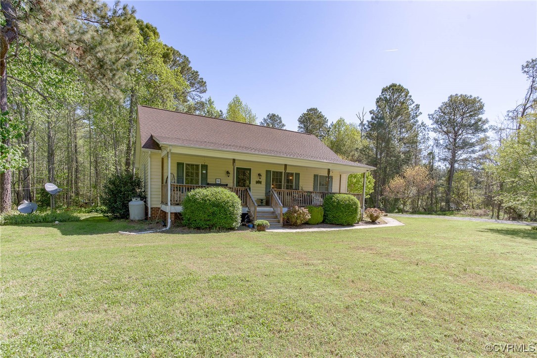 3875 Wakema Road West Point, VA 23181 - Photo 4 of 45 a view of a house with a yard