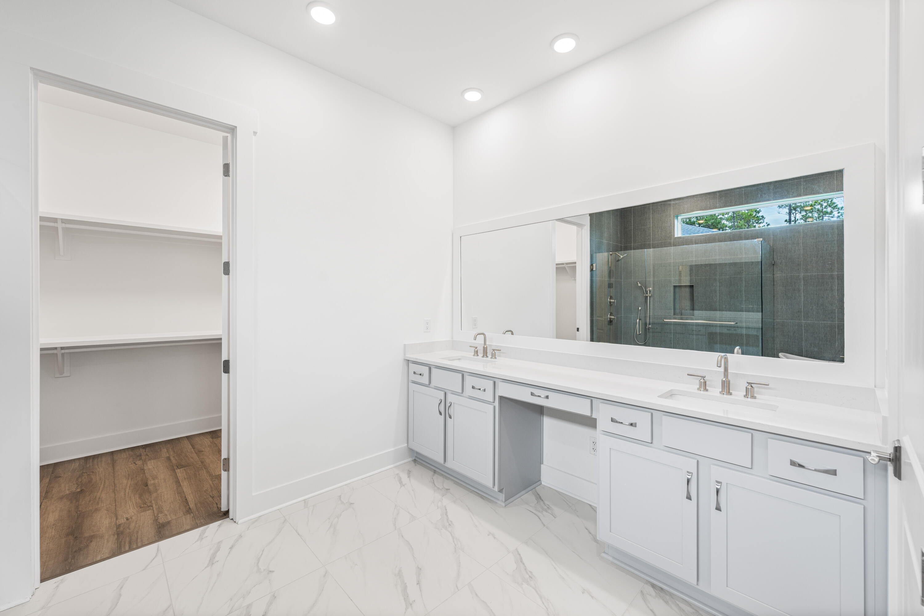 169 Orman Ct Inlet Beach Inlet Beach, FL 32461 - Photo 14 of 23 a bathroom with a sink and a mirror