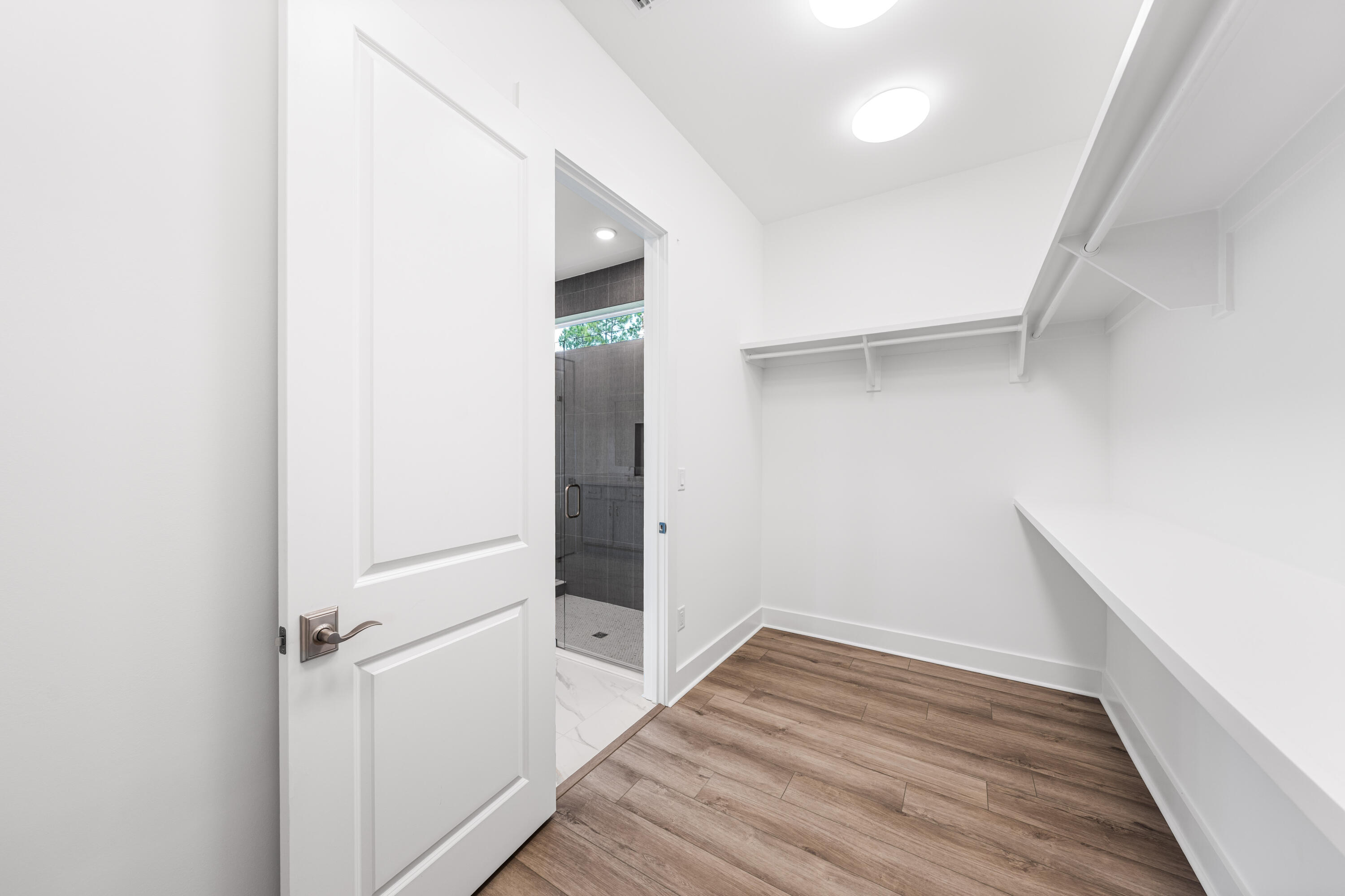 169 Orman Ct Inlet Beach Inlet Beach, FL 32461 - Photo 15 of 23 a view of a hallway with wooden floor