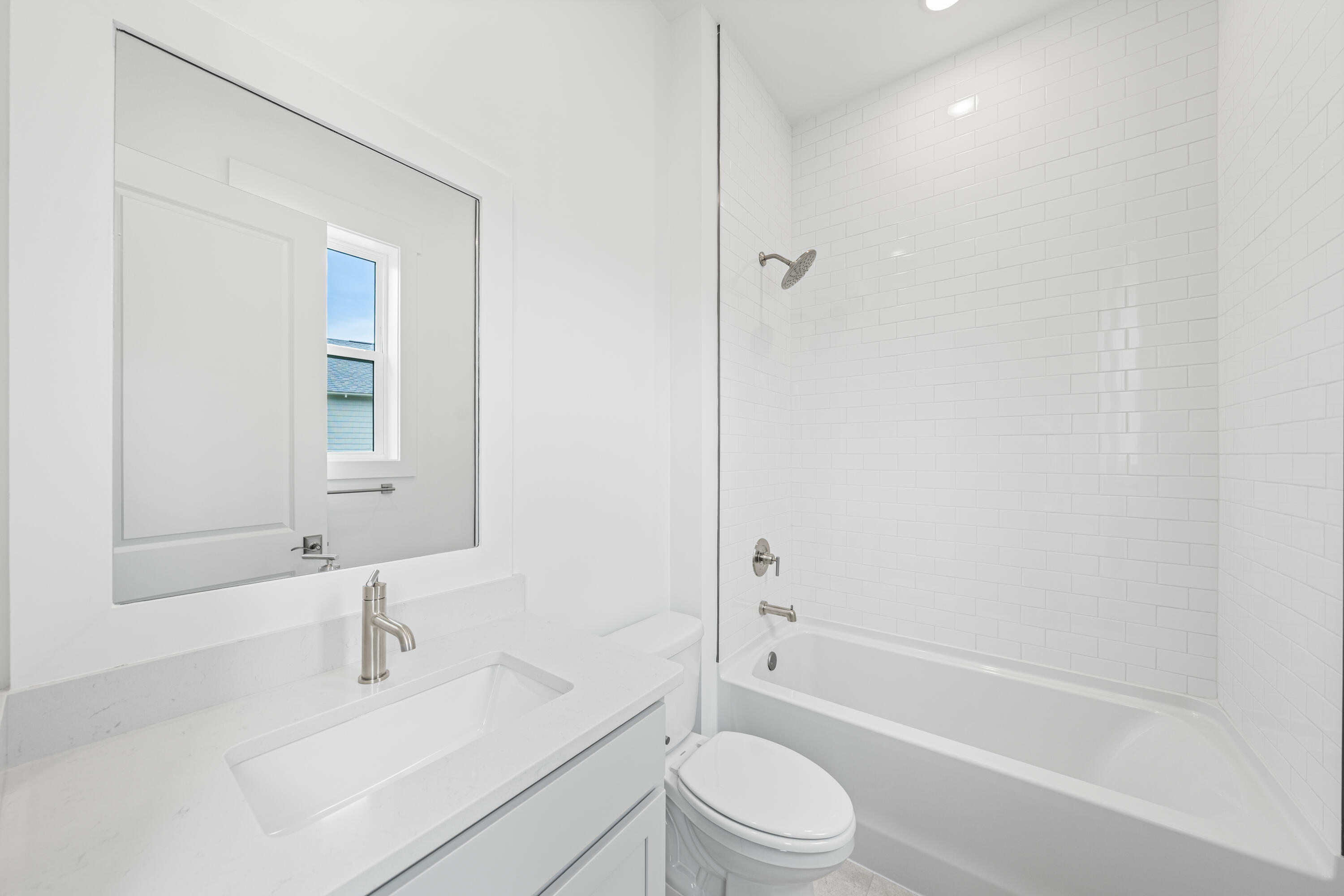 169 Orman Ct Inlet Beach Inlet Beach, FL 32461 - Photo 19 of 23 a bathroom with a bathtub shower sink vanity mirror and toilet
