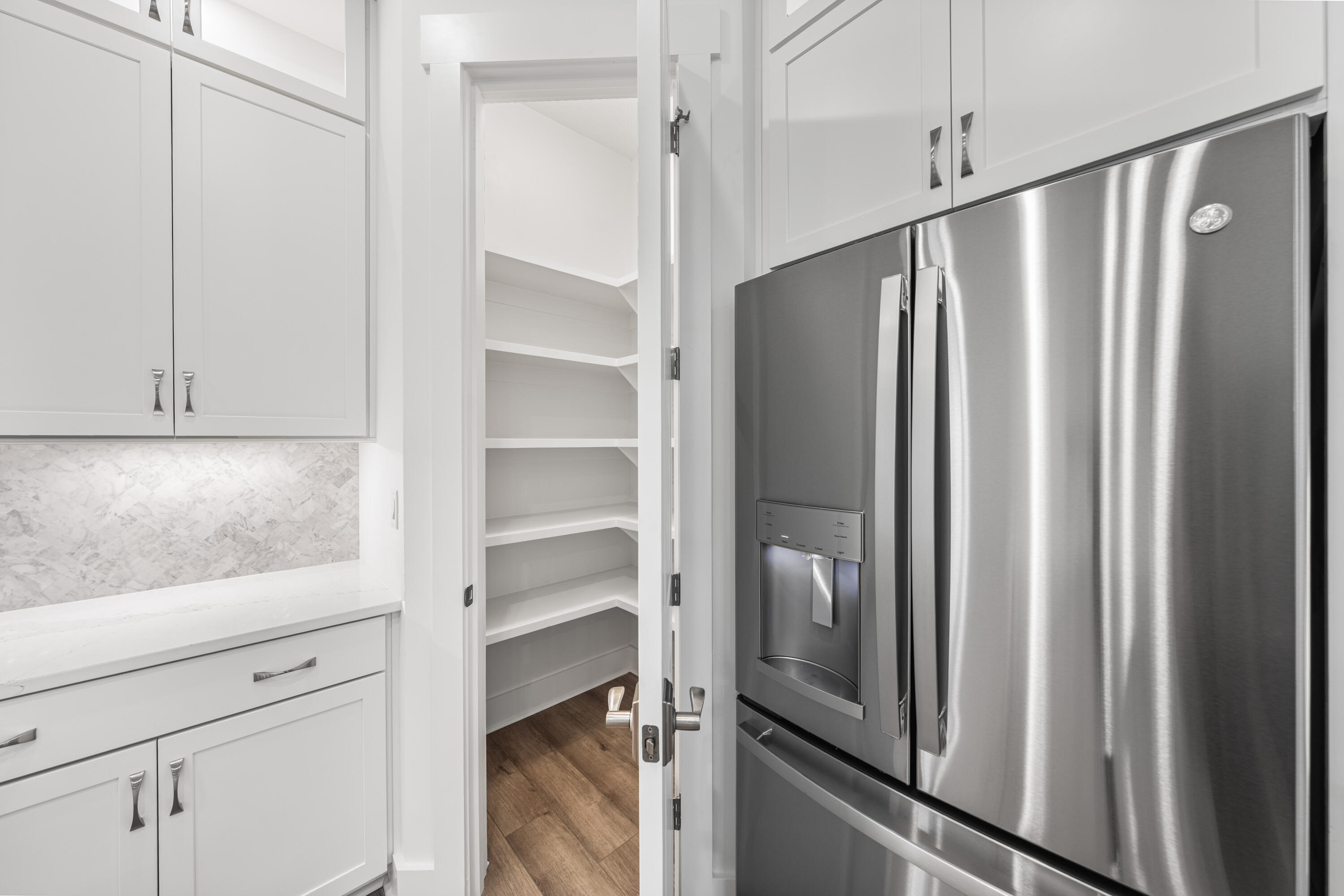 169 Orman Ct Inlet Beach Inlet Beach, FL 32461 - Photo 10 of 23 a view of a refrigerator and window in a kitchen