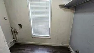 a view of a room with a window