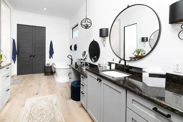 a view of a dry yard with wooden fence