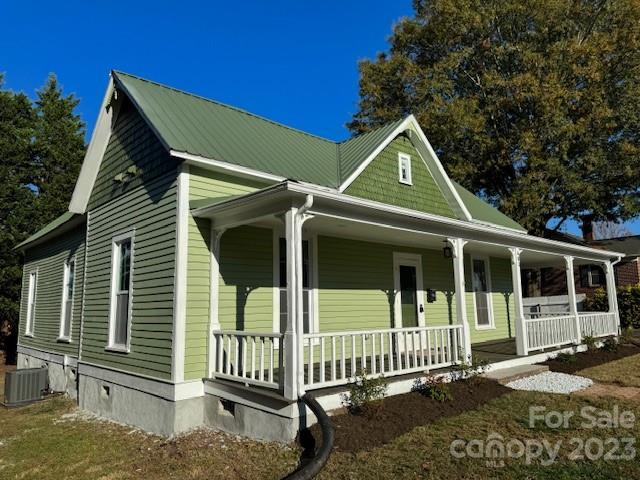 403 2nd Street Southeast Conover, NC 28613 - Photo 2 of 35 a view of a house with a small yard and wooden fence